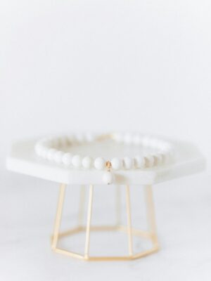 White Bracelet on a  White Table 