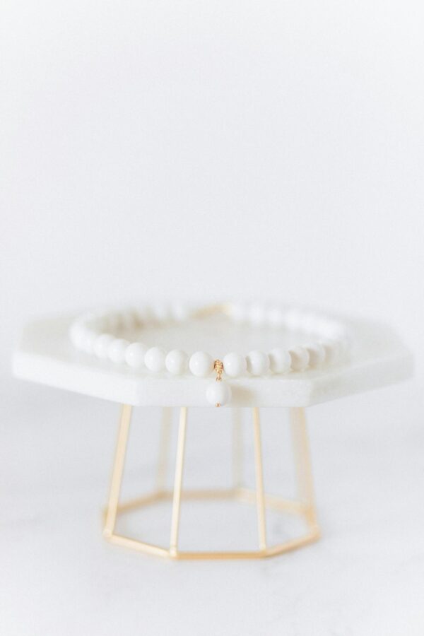 White Bracelet on a  White Table